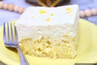 Zesty Lemon Poke Cake Recipe with Luscious Creamy Filling