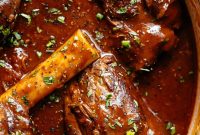 Slow-Braised Lamb Shanks with Red Wine and Herbs