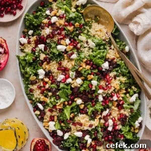 This Winter Kale and Quinoa Salad is a vibrant, wholesome salad that is bursting with flavor! Made with leafy kale, tender quinoa, juicy pomegranate seeds and crunchy walnuts all tossed together with a light dijon vinaigrette for the perfect holiday side dish!