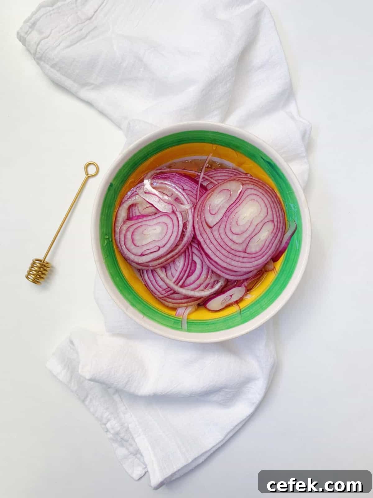 Bowl of homemade onion and honey cough syrup