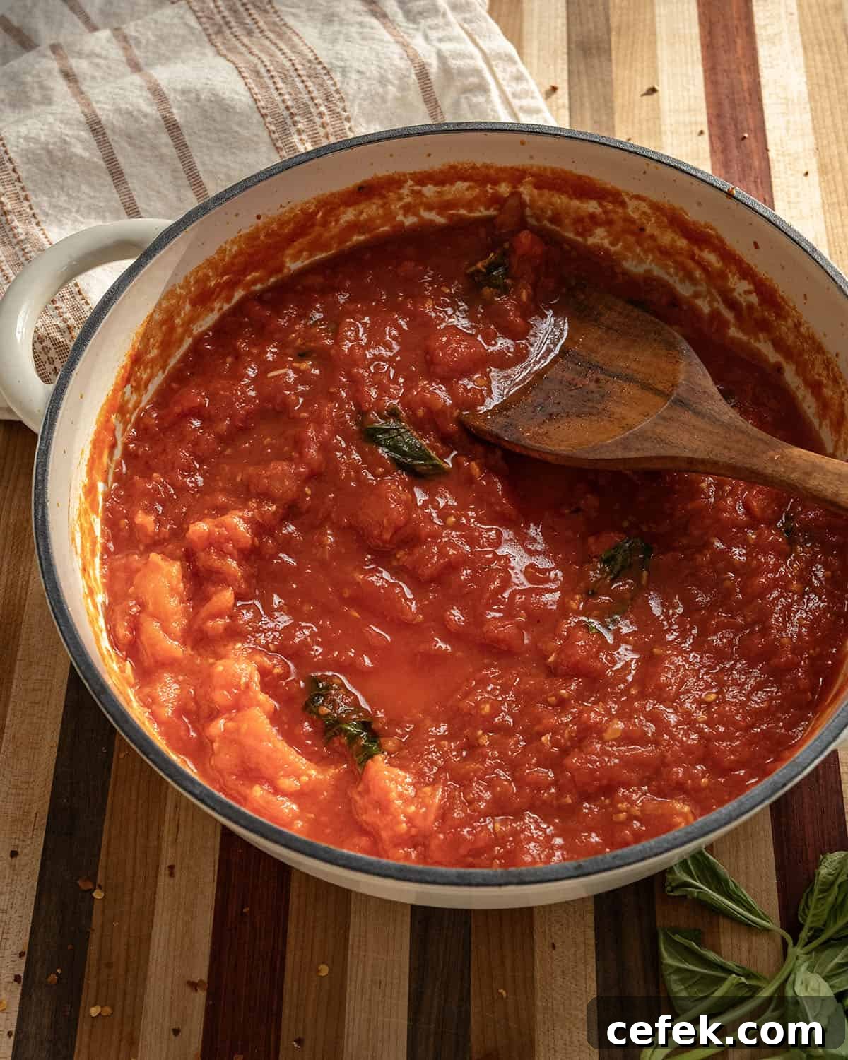 Spicy marinara sauce in a pan.