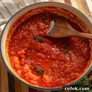 Spicy marinara sauce in a pan.