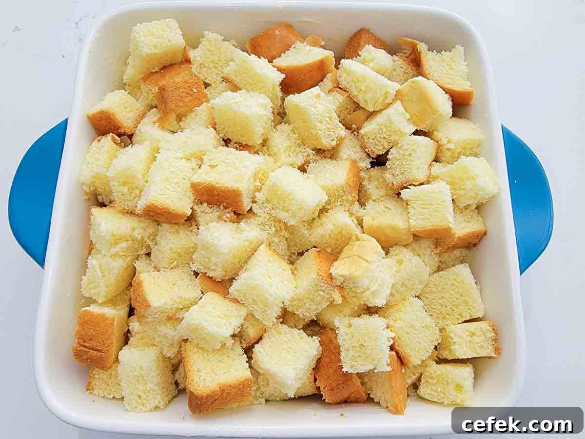 bread cubes in a baking dish.