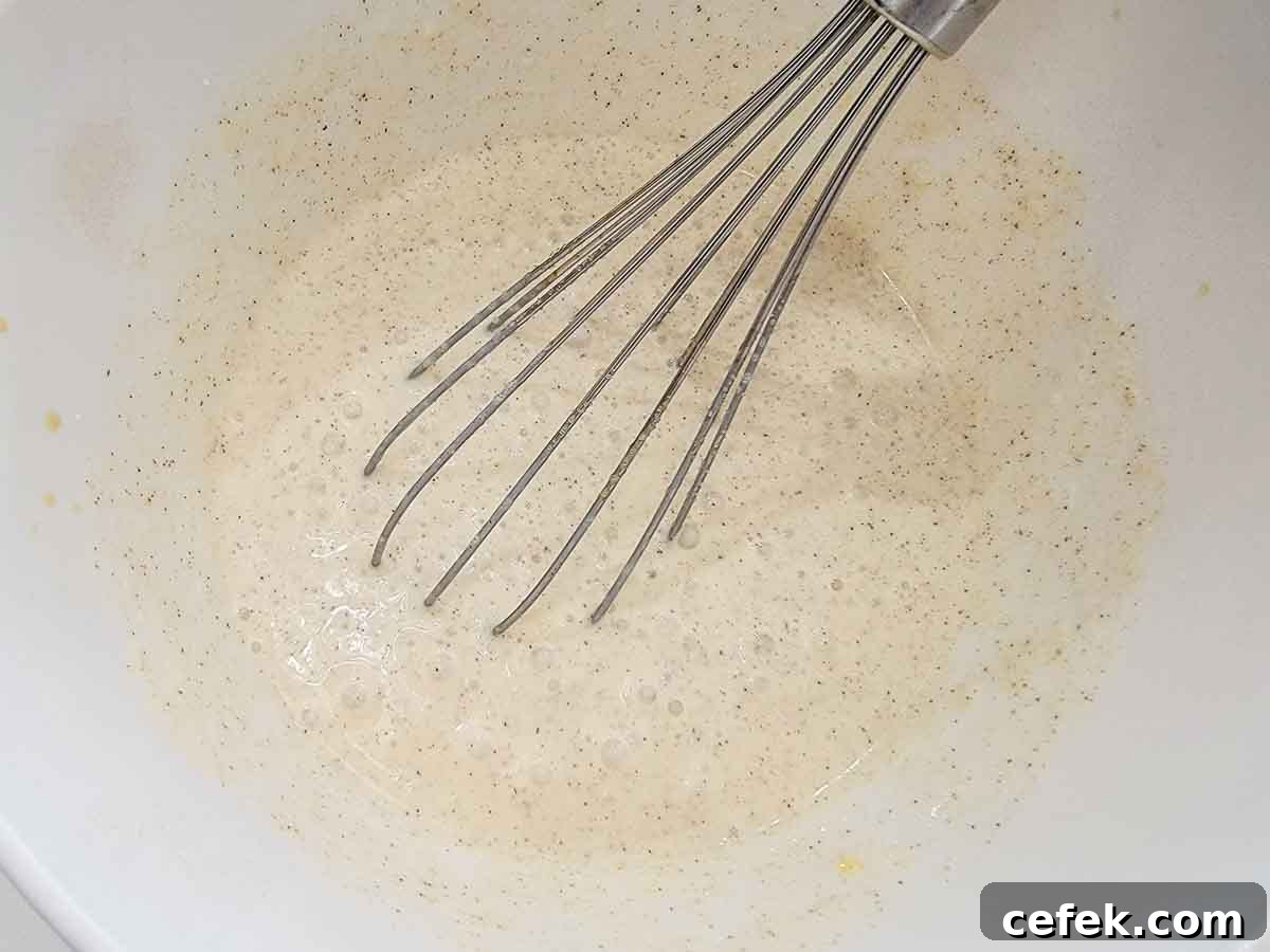 french toast batter whisked in a bowl.