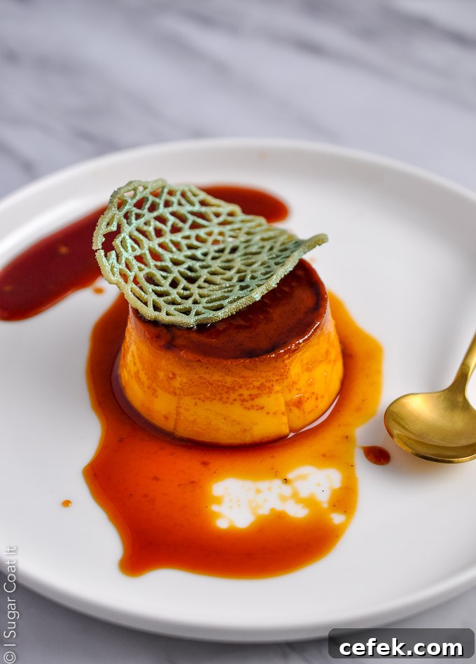 sous vide creme caramel plated with a green lace leaf accent | i sugar coat it