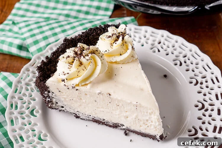 This Irish Cream Pie is an easy dessert laced with Baileys and perfect for St. Patrick's Day! A chocolate cookie crust filled with a cream marshmallow and Irish Cream filling and topped with vanilla whipped cream!