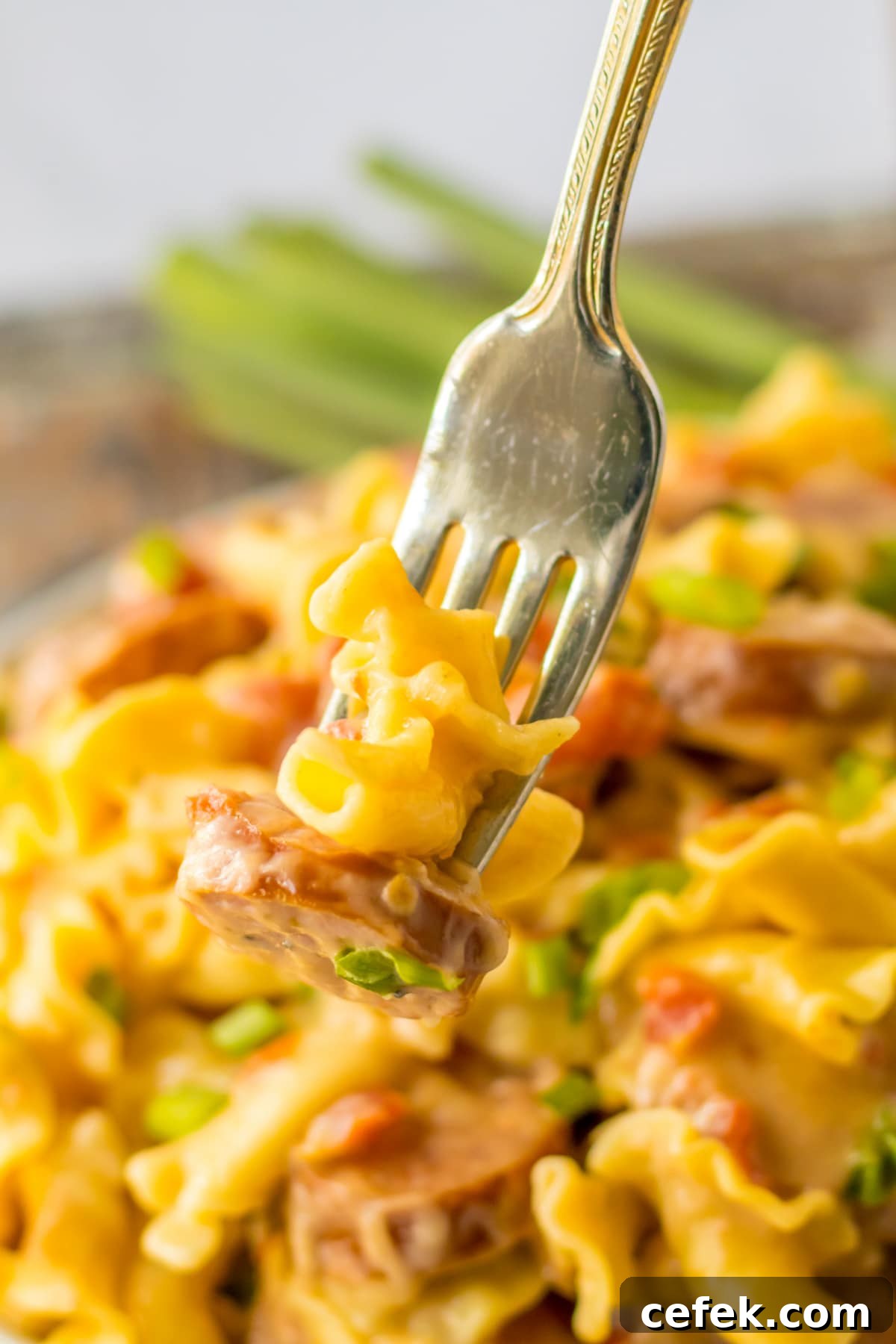 sausage pasta on a fork