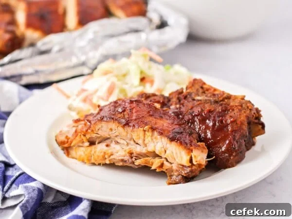 Baby back ribs served with coleslaw.