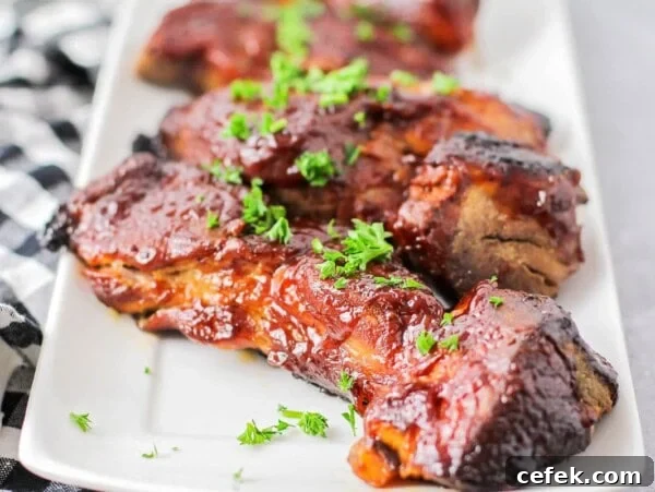 Our country ribs recipe topped with fresh herbs.
