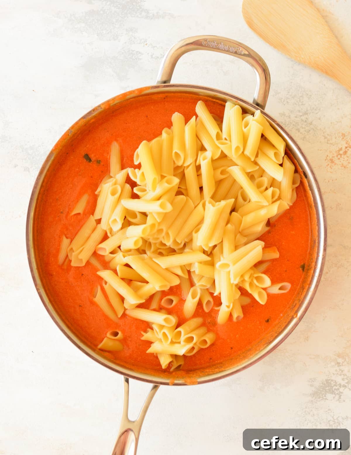 pink pasta sauce with noodles