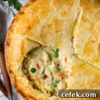 overhead shot of gluten-free pot pie with an opening showing filling