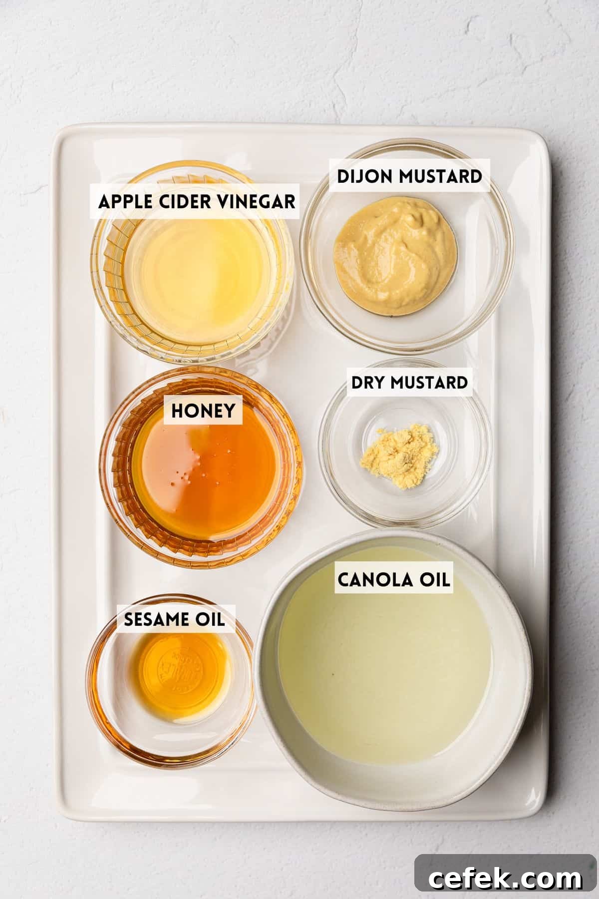 Ingredients to make honey mustard.