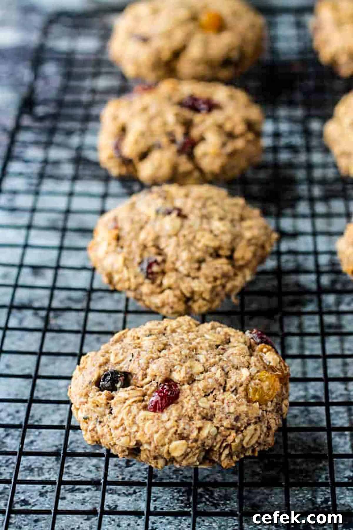 Close up of a cookie cooling on a wire rack.