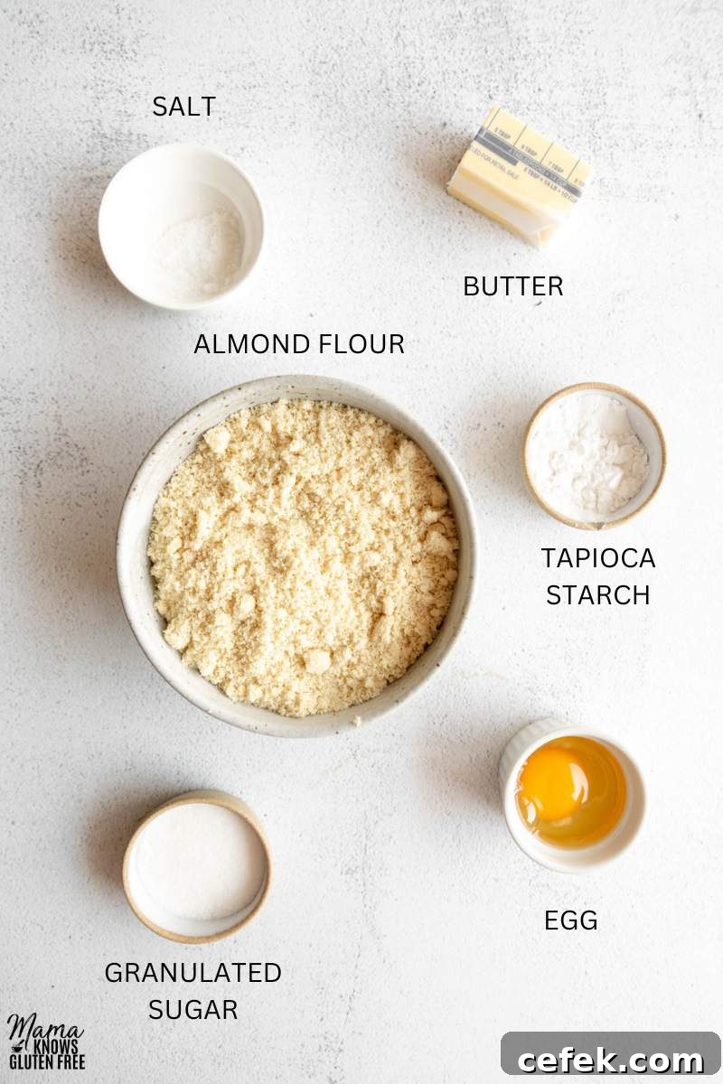 Ingredients for Gluten-Free Almond Flour Pie Crust measured in bowls.