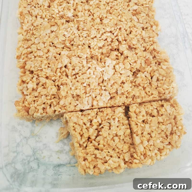 Peanut butter rice Krispie squares in a glass baking dish