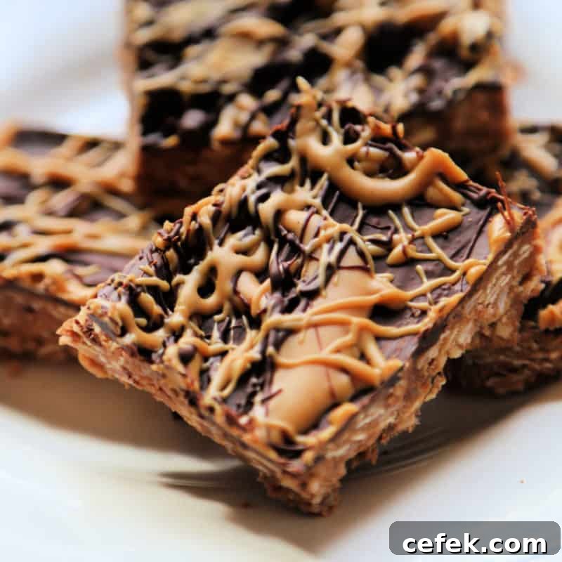No Bake Chocolate Oatmeal Bars piled on a white plate