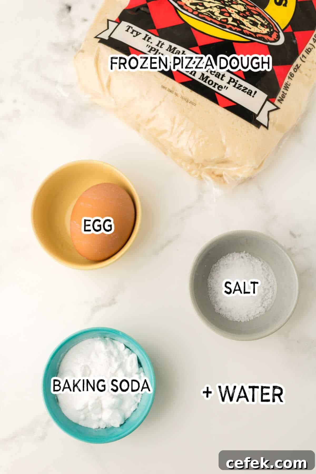 Ingredients on a white marble counter.