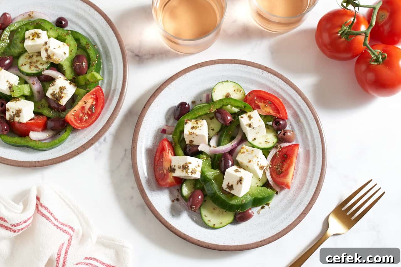 Two plates of traditional Greek salad.