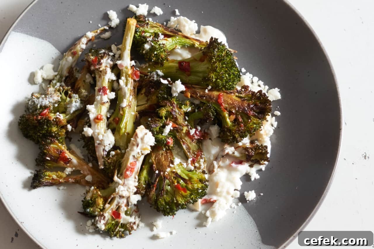 Charred broccoli with Calabrian chili paste on a plate.