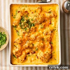 Looking down on a very cheesy Cauliflower Cheese, cooked and ready to serve.