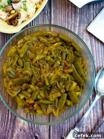 Overhead shot of a dish of curried green beans.