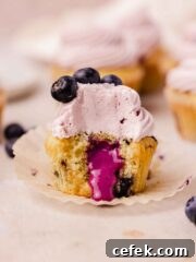 blueberry cupcake with blueberry curd filling