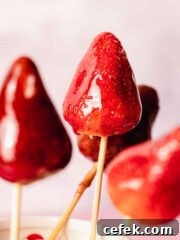 strawberry tanghulu standing up inside a cup