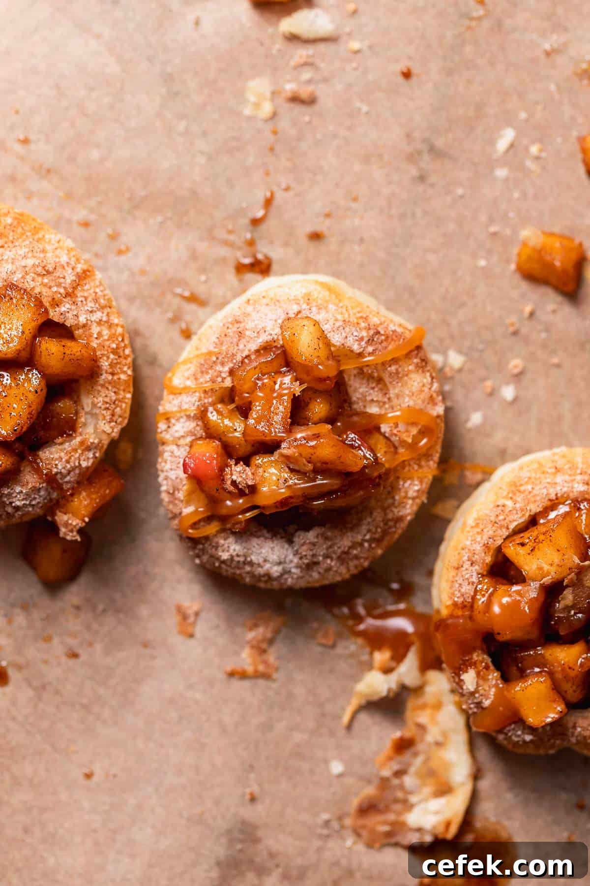 Apple pie cookies with caramel drizzled on top.