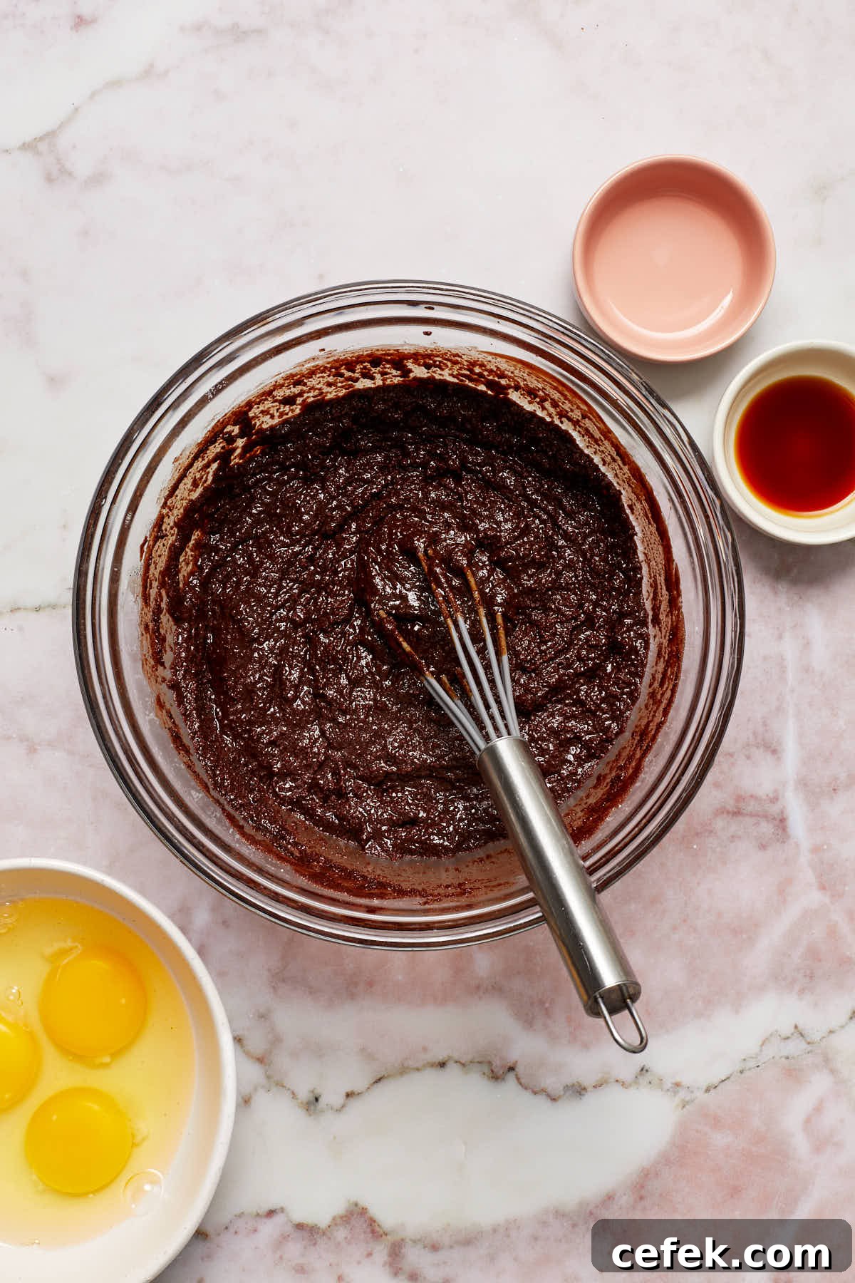 Melted chocolate mixture whisked together with sugars and coffee.