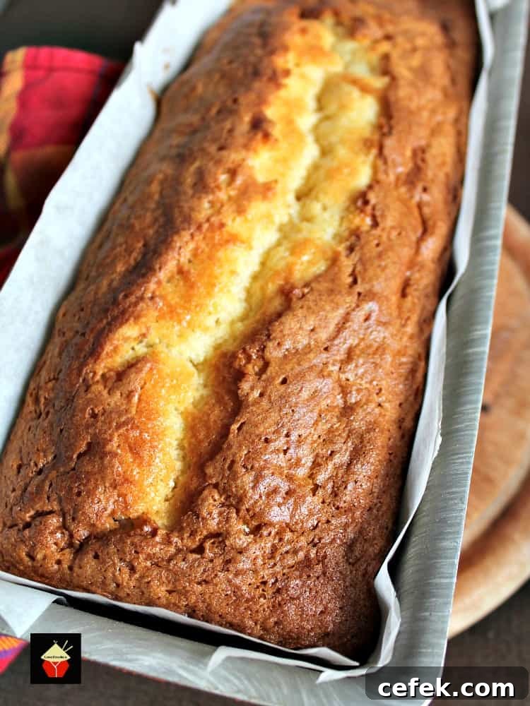 Blueberry Lemon Pound Cake, a delicious soft and moist loaf bursting with juicy blueberries! Perfect with a cup of tea