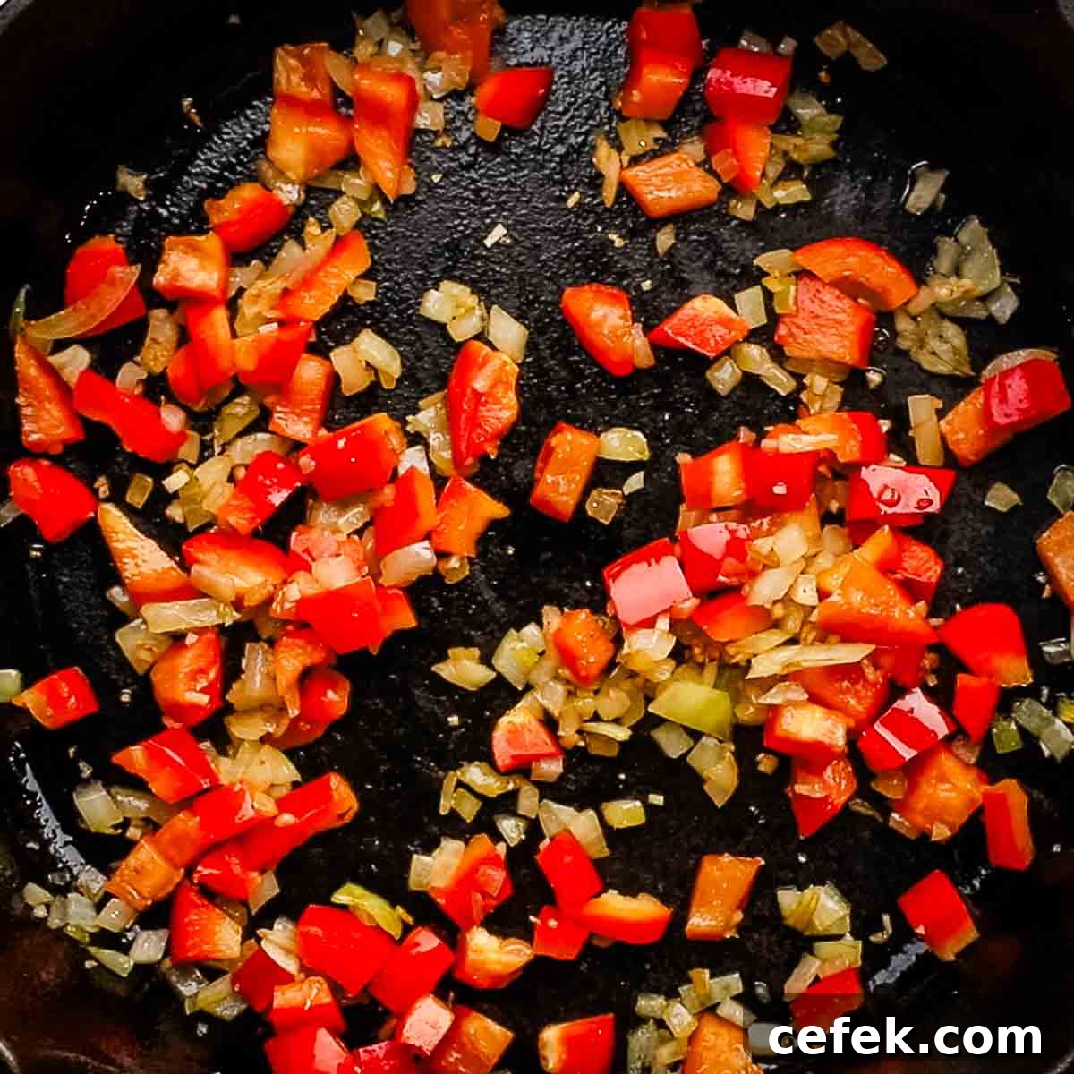 cooking bell pepper with the onion and garlic