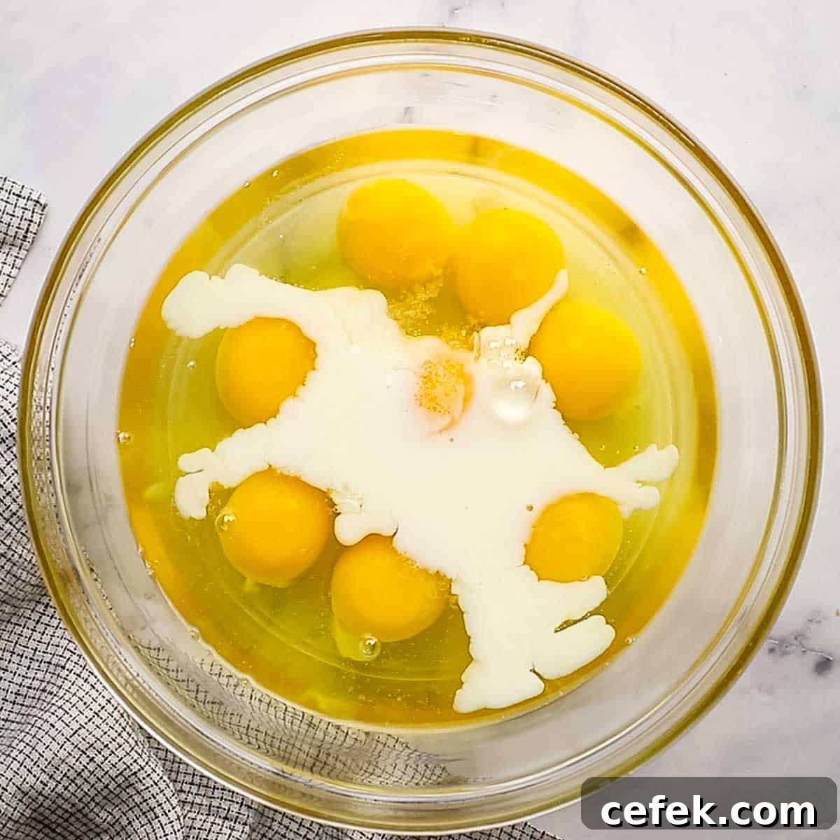eggs and milk in a large bowl