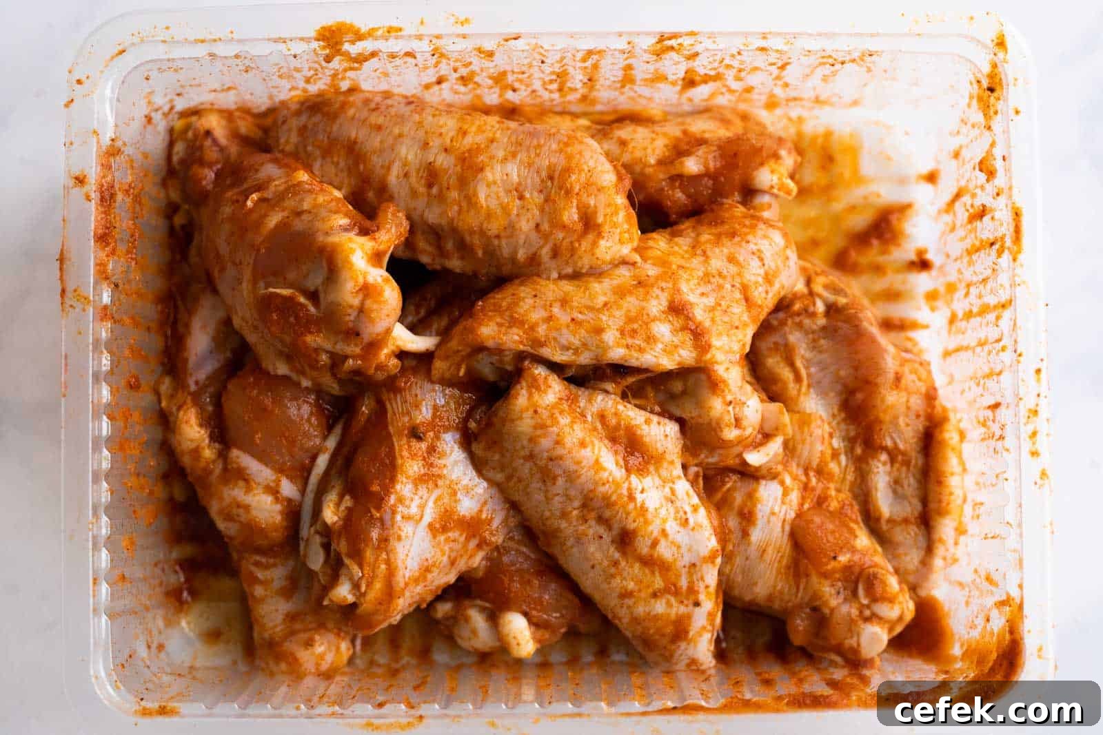 Marinated Chicken Wings in a disposable container