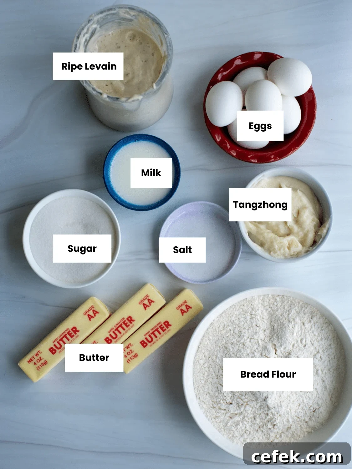 Ingredients on a counter include ripe levain, eggs, milk, sugar, salt, butter, bread flour, and tangzhong.