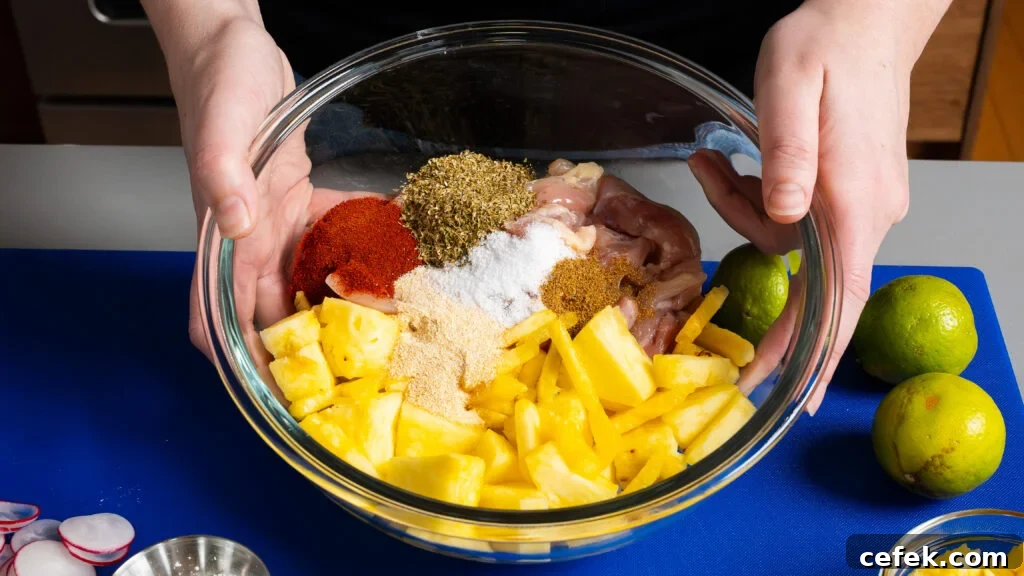 Ingredients for a chipotle chicken recipe in a mixing bowl.