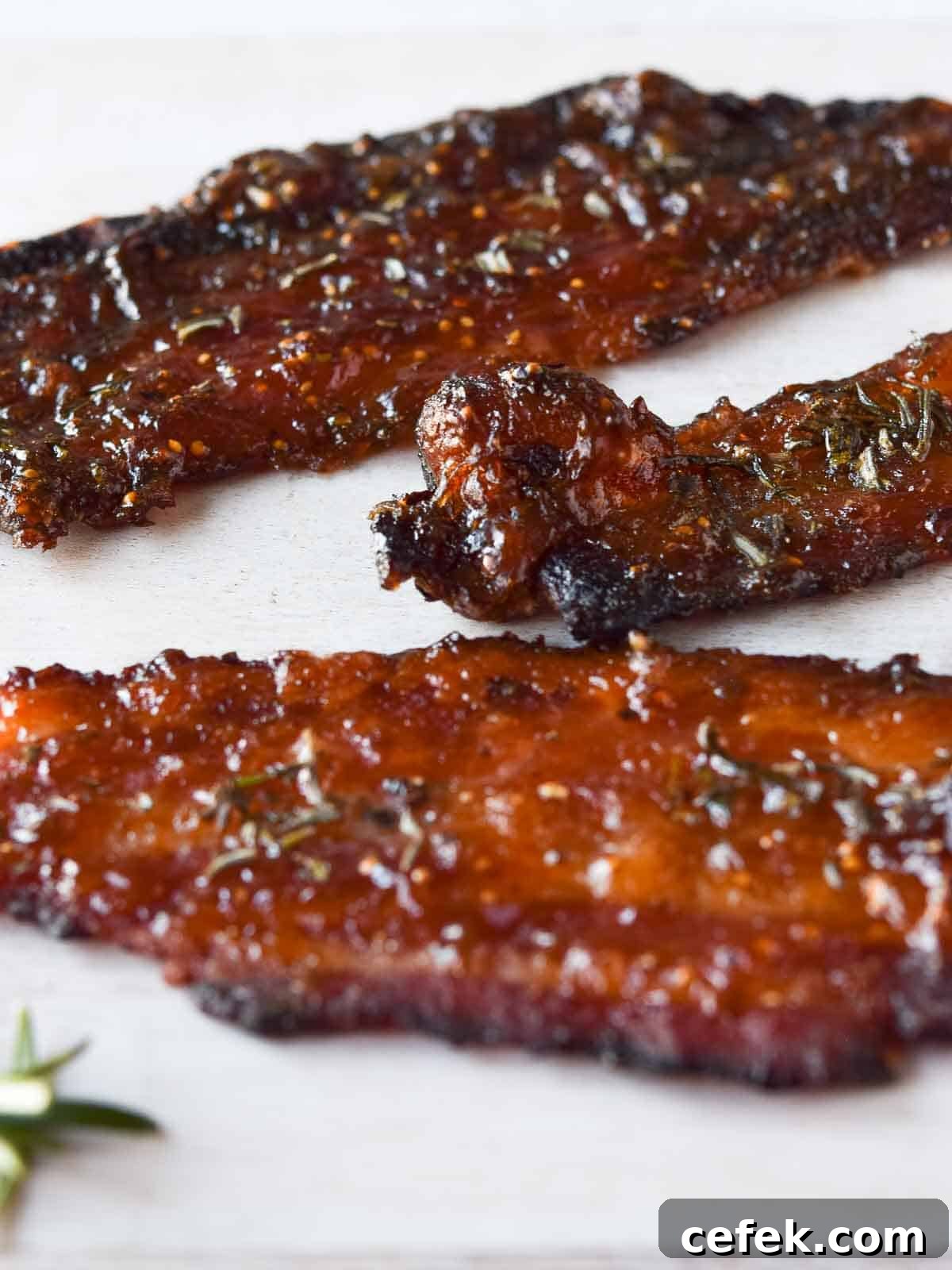 Close-up of candied rosemary and fig bacon.