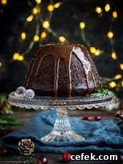 Vegan steamed chocolate pudding - this sumptuous steamed chocolate pudding with chocolate sauce is a delicious alternative to Christmas pudding; or is just perfect for any special occasion! #vegan #dessert #pudding
