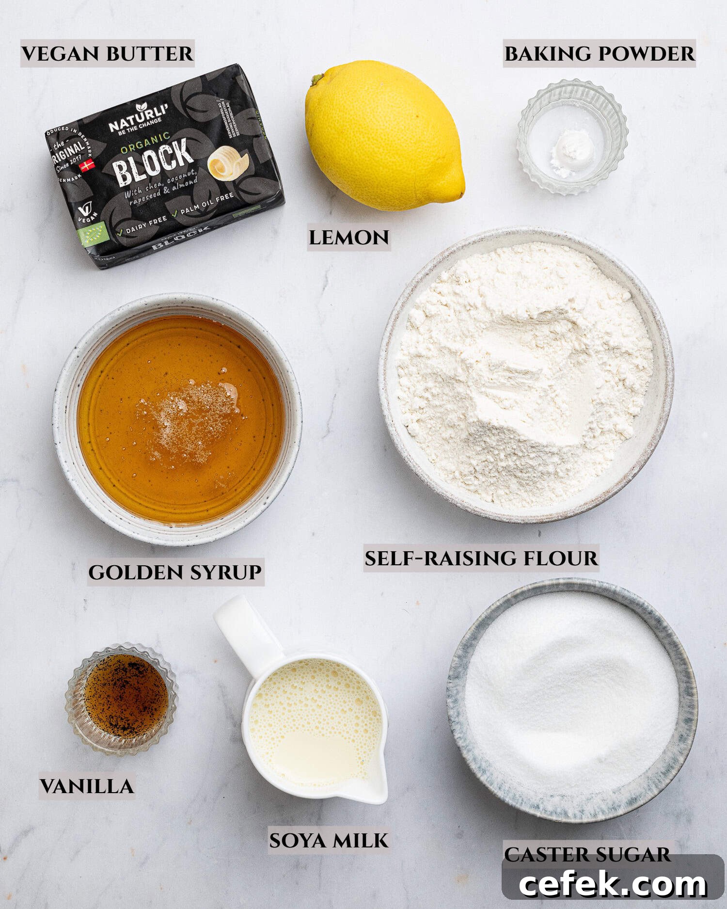 A labelled photo of the ingredients needed to make vegan steamed syrup sponge pudding.