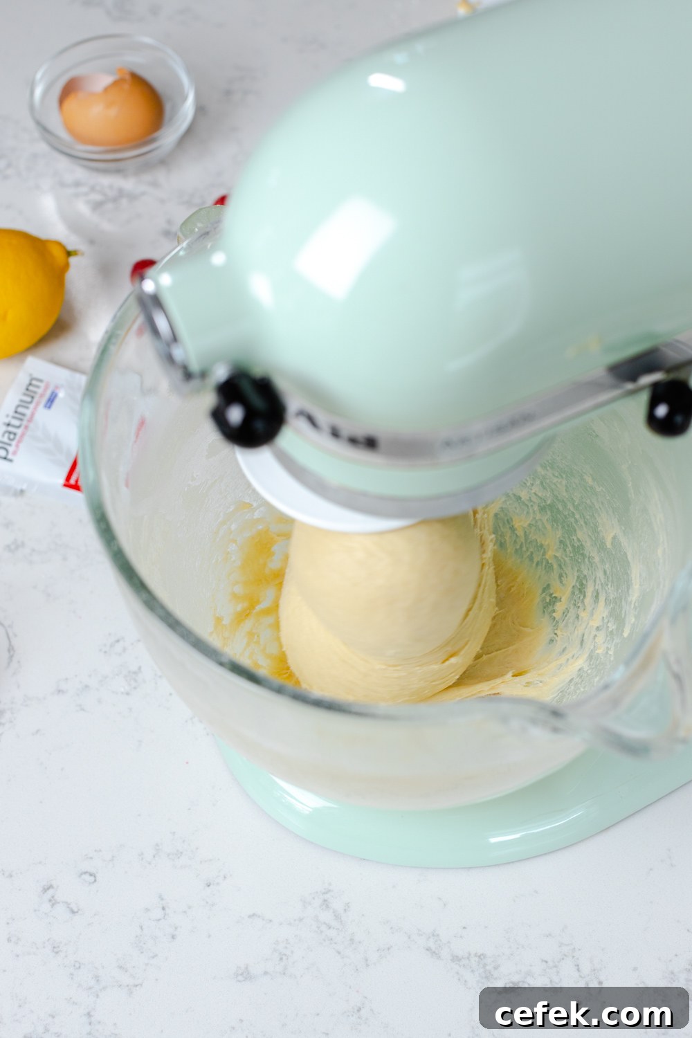 bread dough clinging around dough hook