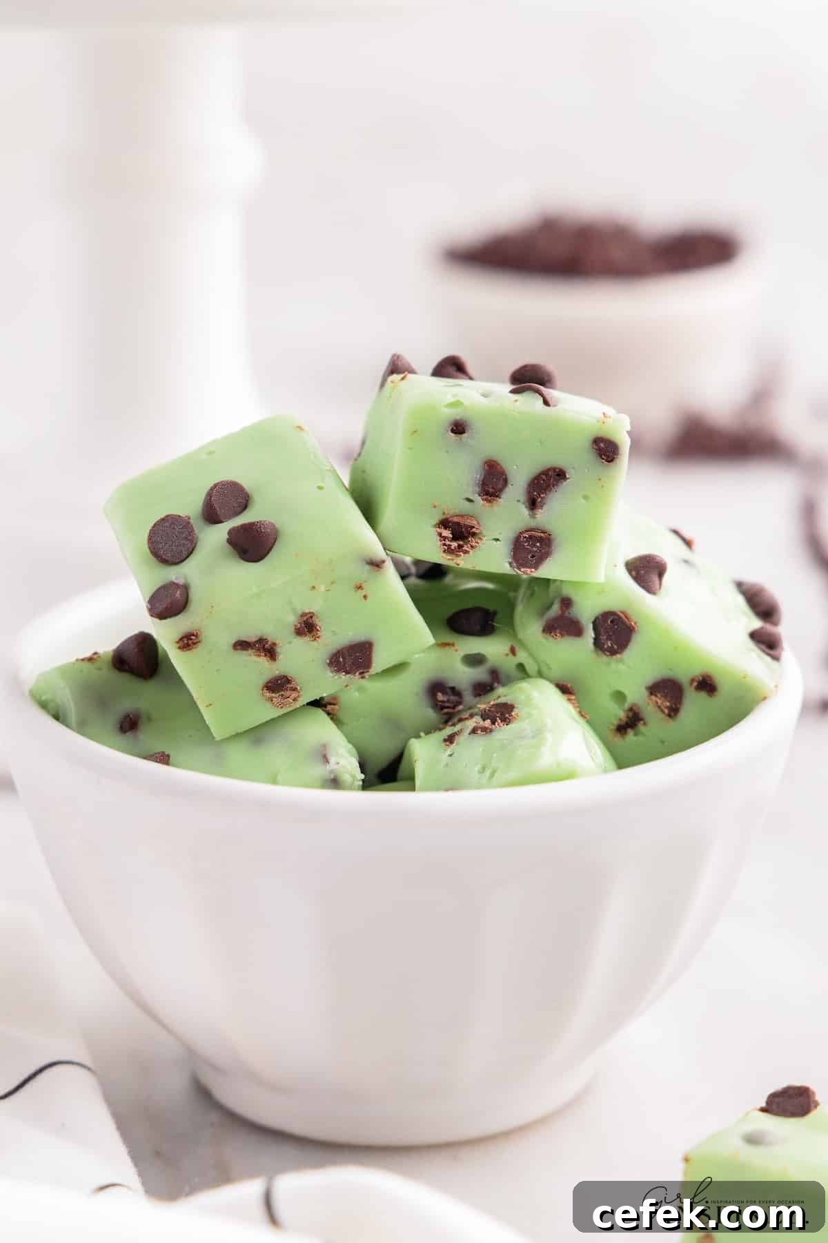 A bowl of Mint Fudge with mini chocolate chips.