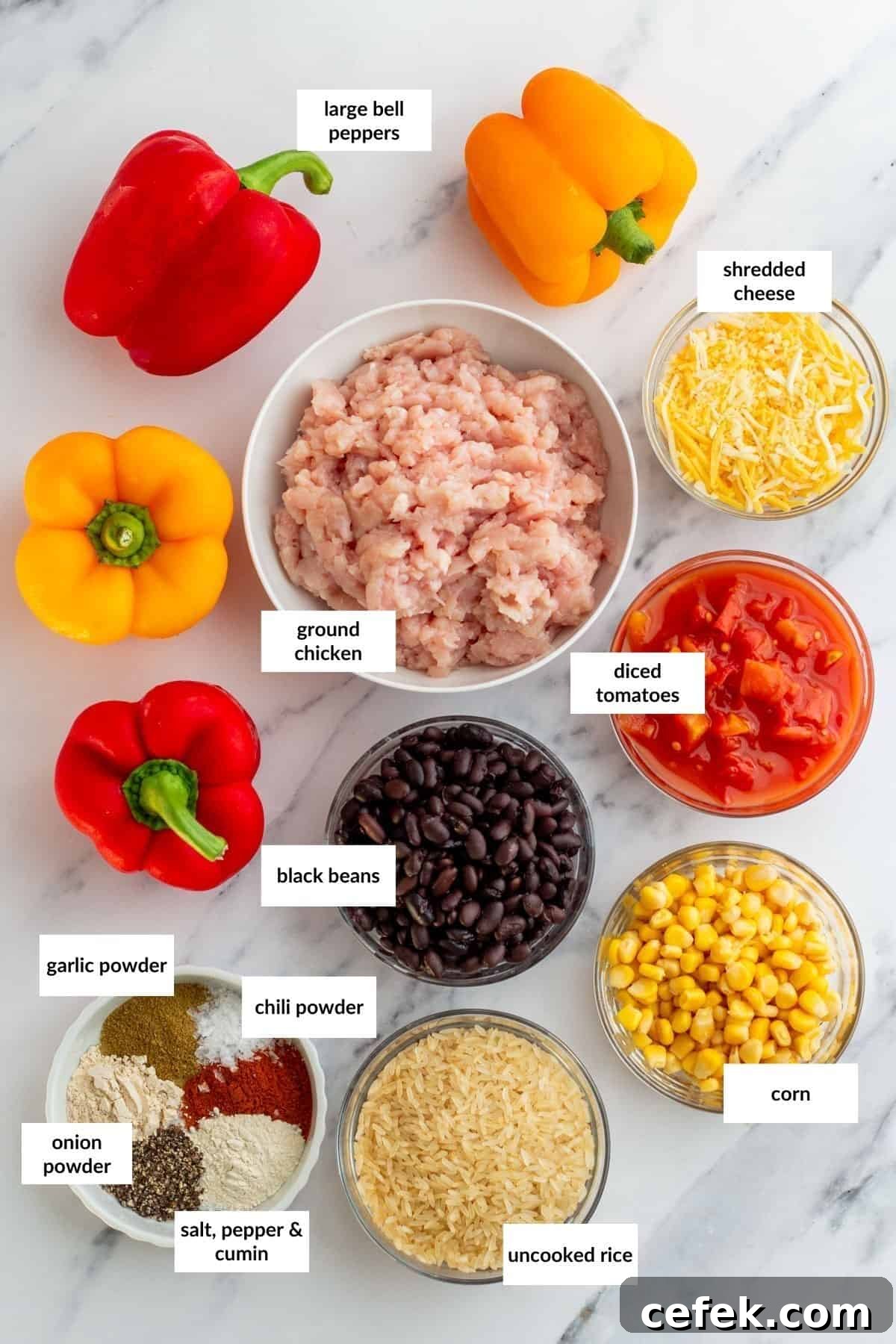 Ingredients for stuffed peppers recipe arranged on a kitchen counter.
