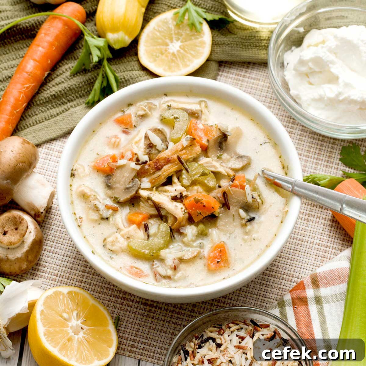 A bowl of creamy chicken and wild rice soup without cream and with greek yogurt.