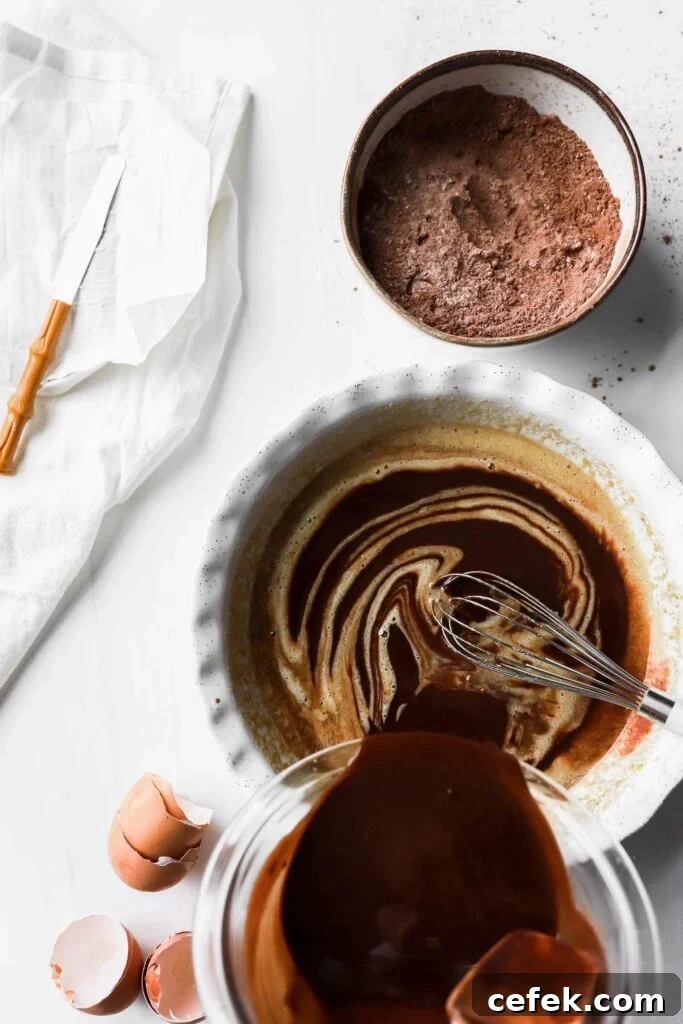 slowly whisk in chocolate and butter to sugar and eggs