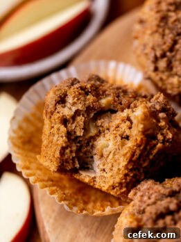 Bite missing from apple muffins.