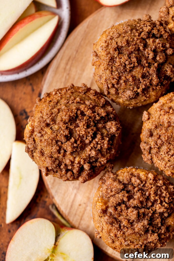 Top view of muffins on a wood board.