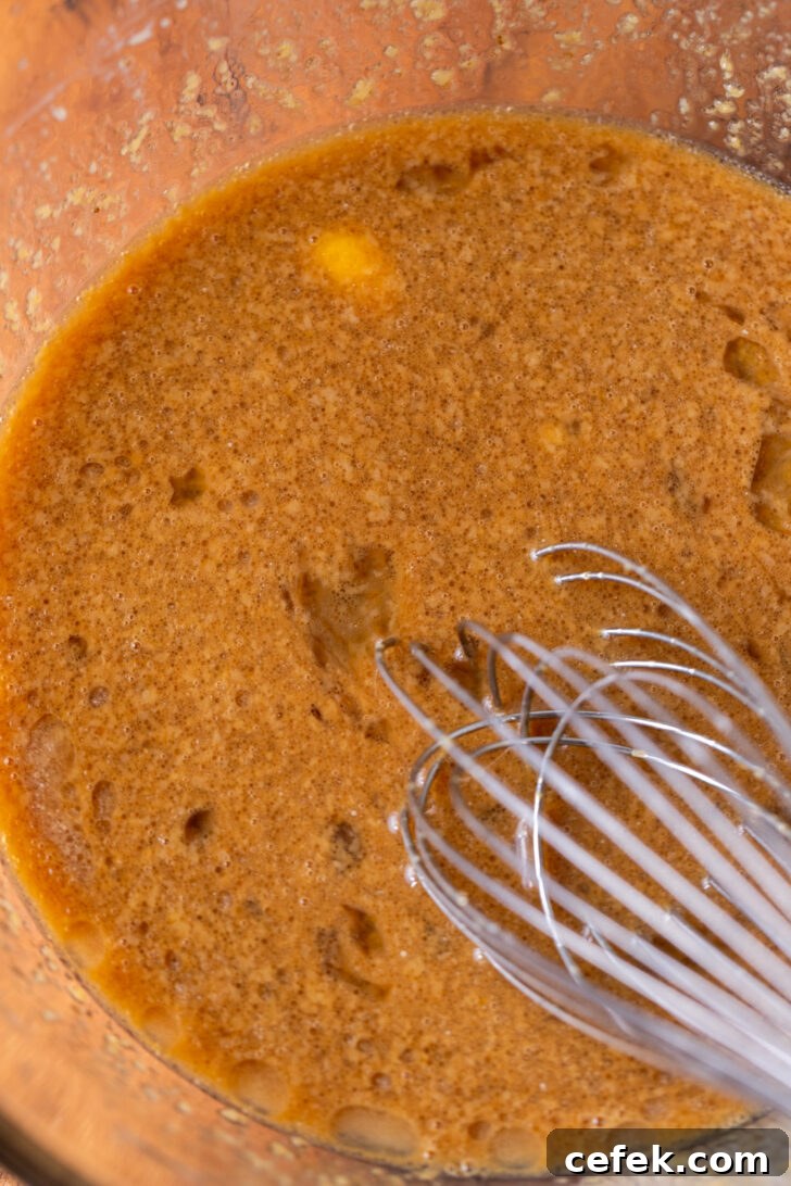 Wet ingredients in a bowl.