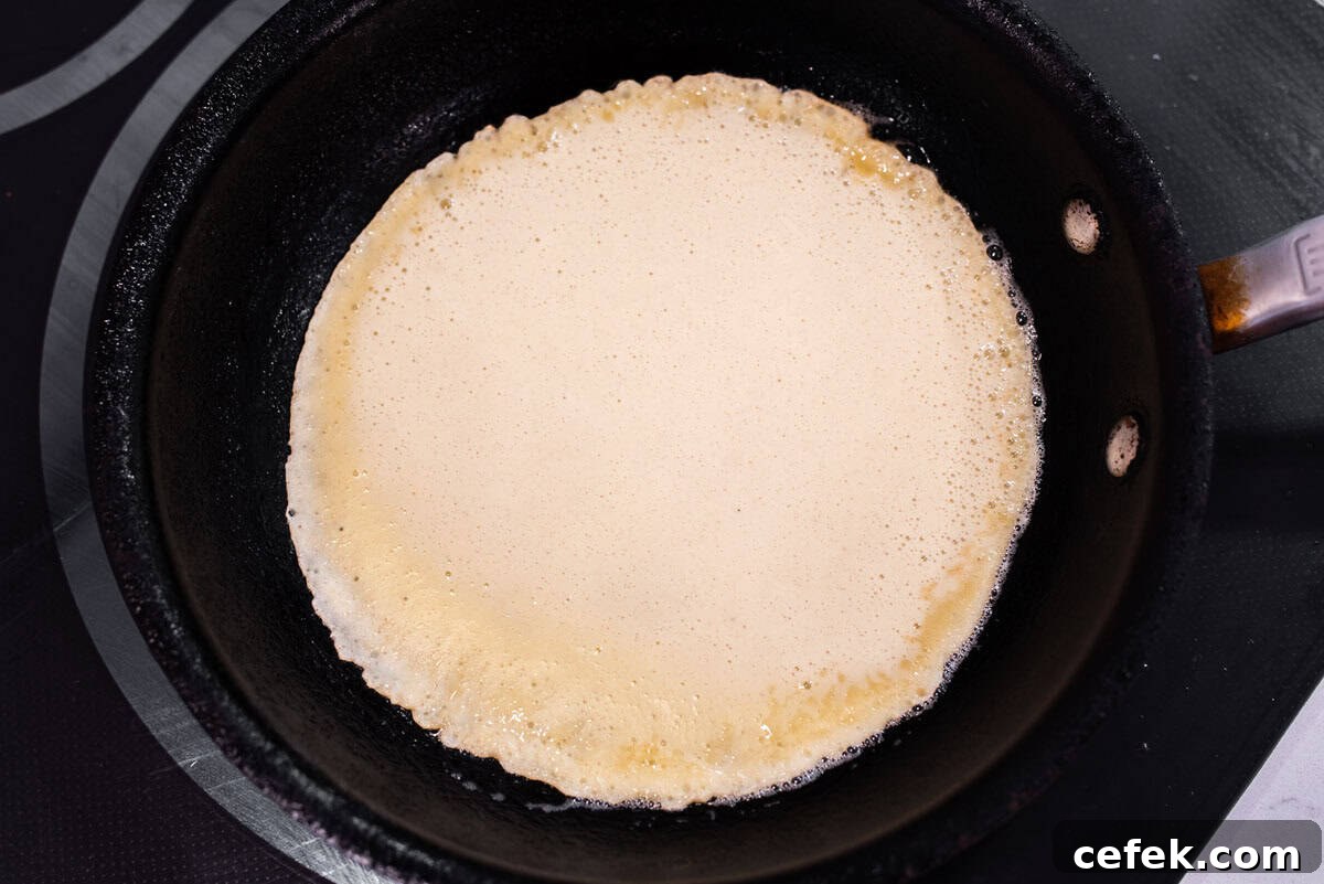 Crepe batter in skillet.