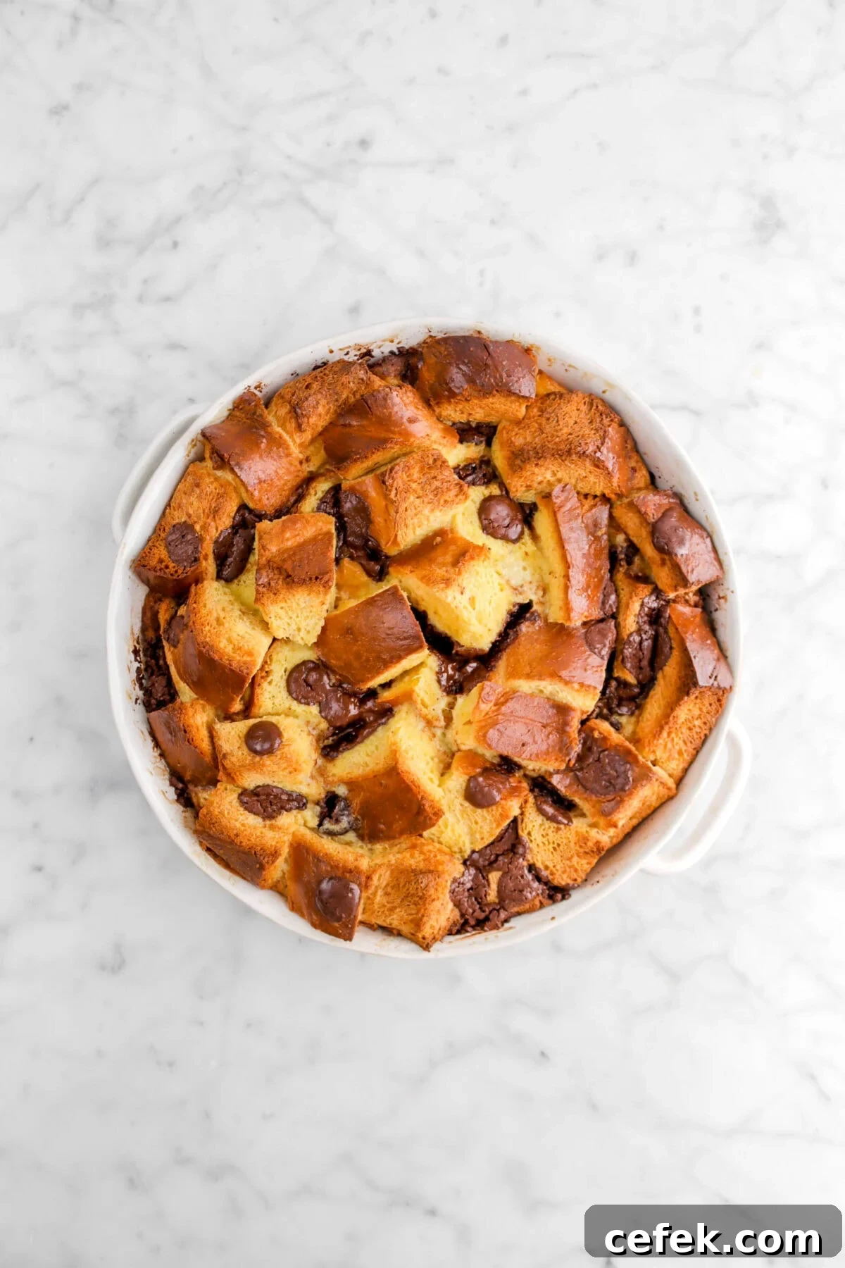 chocolate chip bread pudding in round casserole.