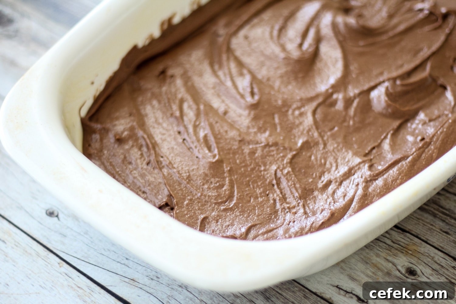 Mississippi mud cake batter in a cake pan