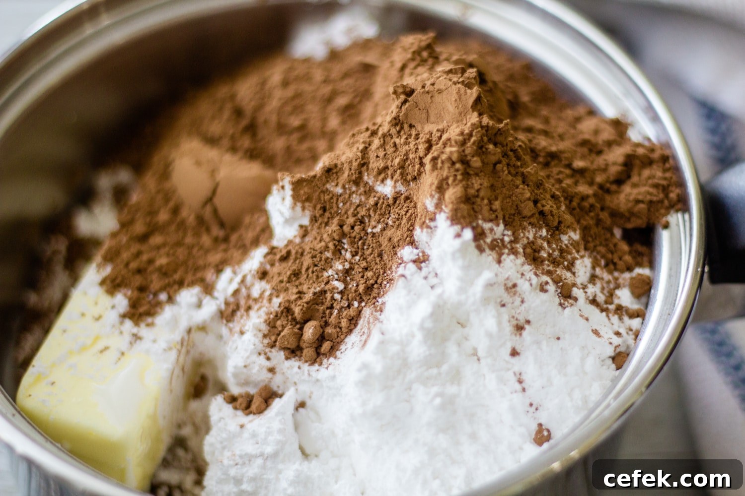 ingredients to Mississippi mud cake in a bowl